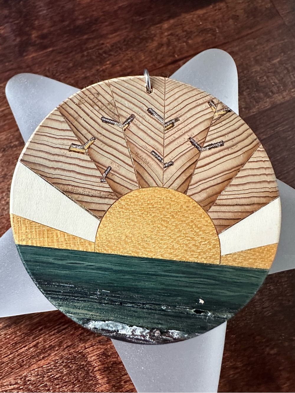 Wooden sunrise over the beach pendant